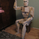Illustration for article titled A life-sized Cylon made out of wood